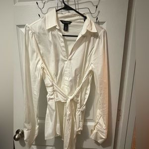 Office shirt with tie.